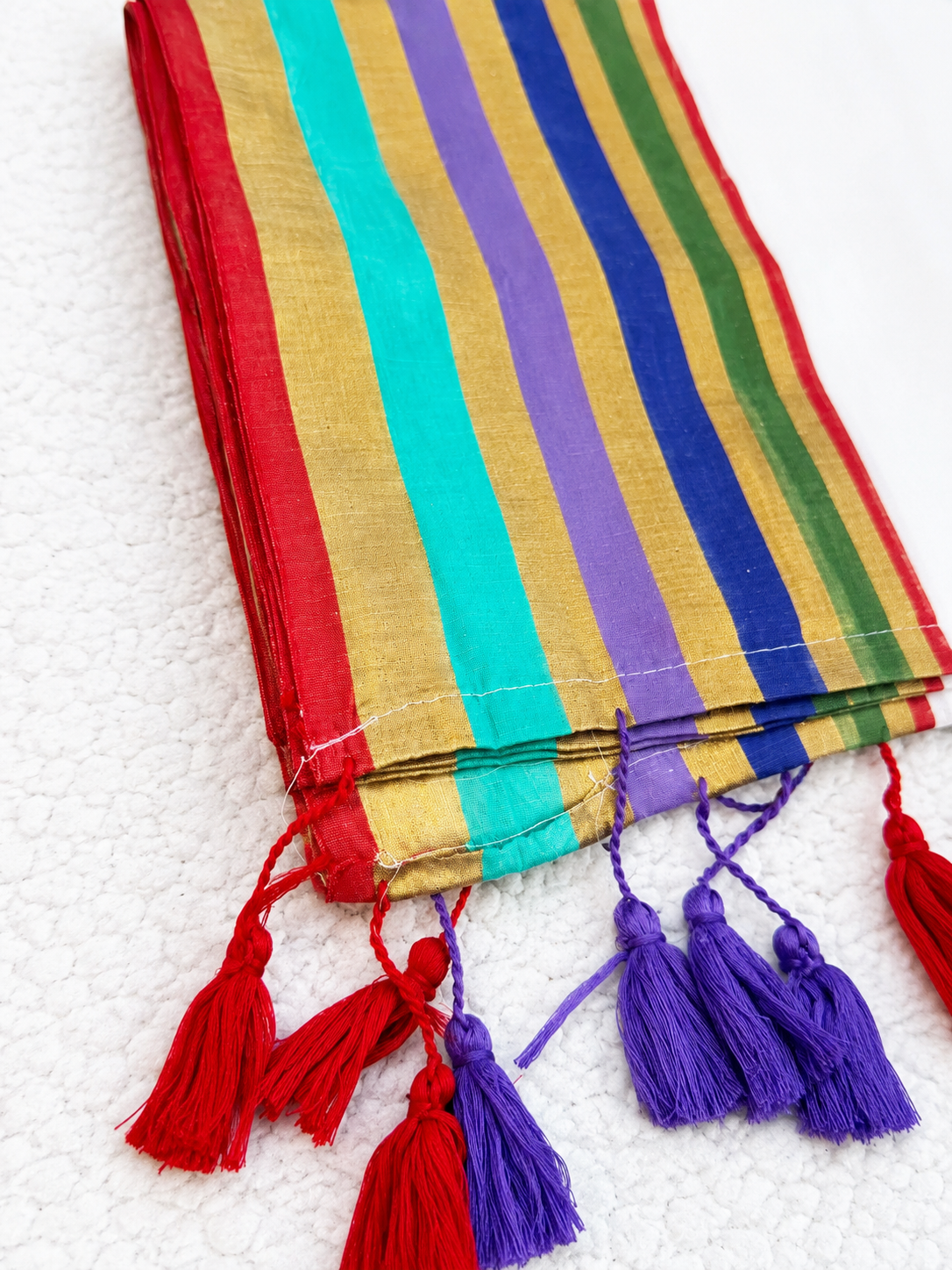 Mulcotton Saree | White Saree with Multicolour Striped Gold Zari Border | Red & Purple Tasselled Edge