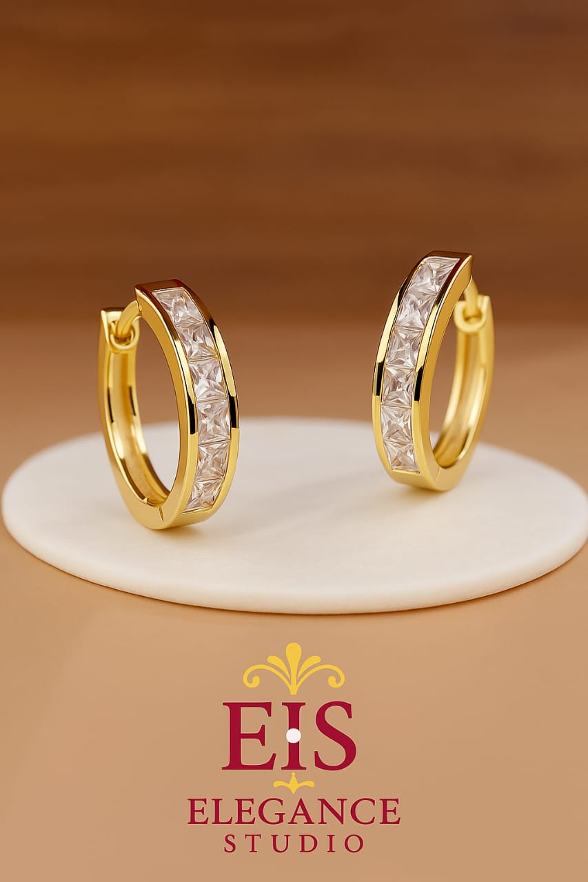 Elegant hoop earrings with crystal embellishments in gold plated and silver finishes