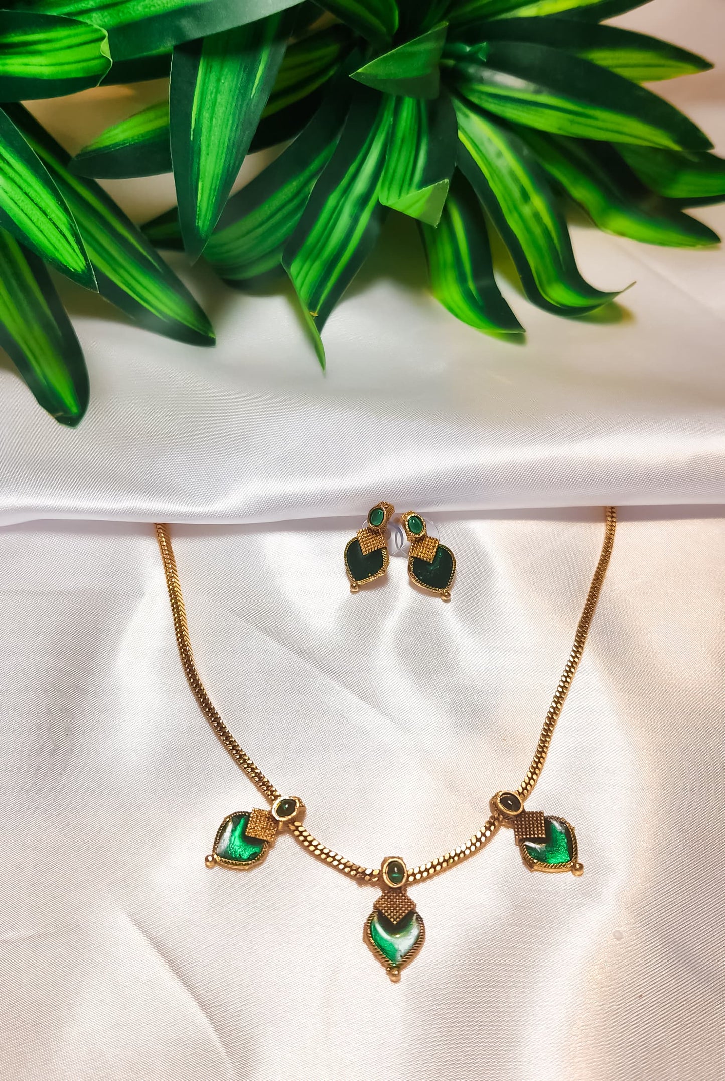 Simple gold-tone green stone necklace for daily and festive wear