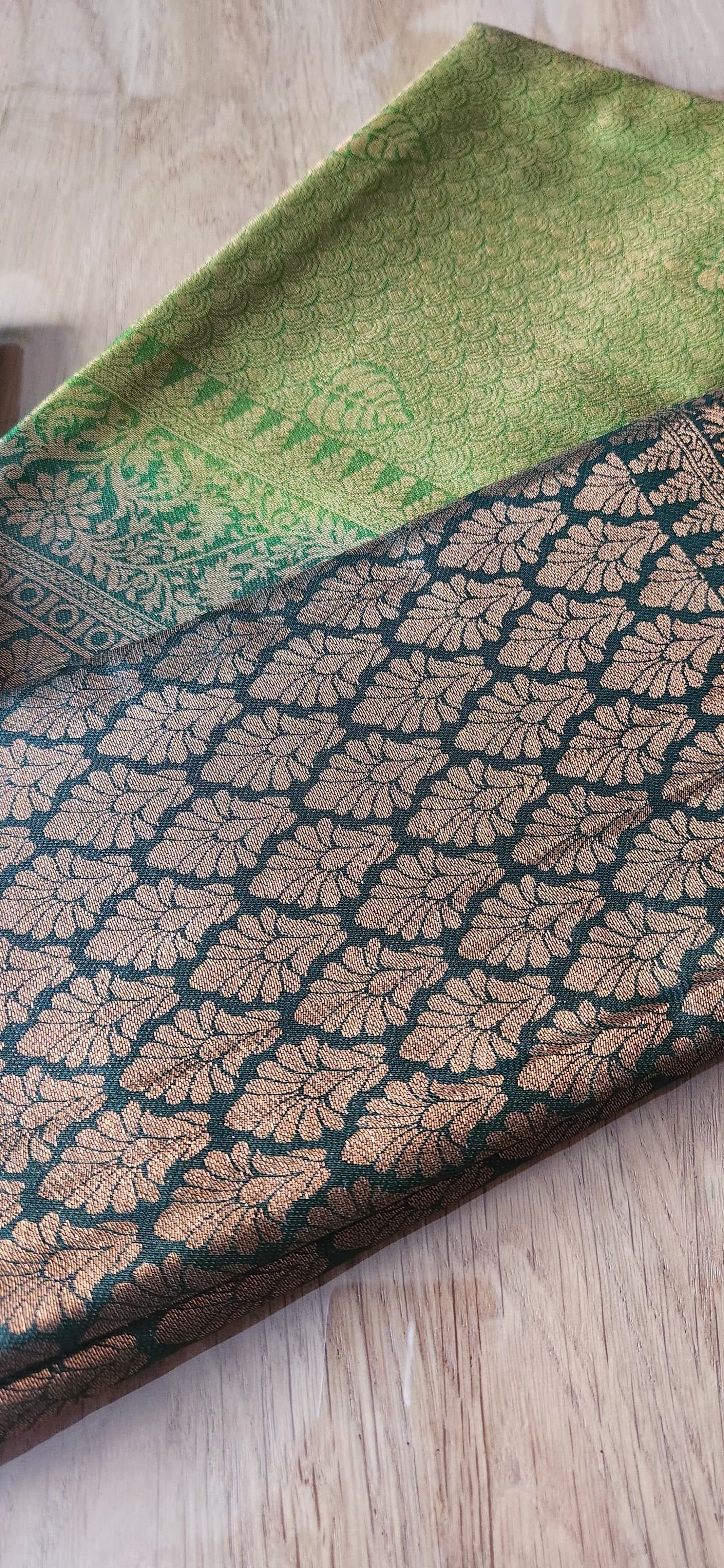 Kubera Silk Signature Traditional Border Saree with woven silk body and intricate traditional border, neatly styled on a tabletop with minimal décor.