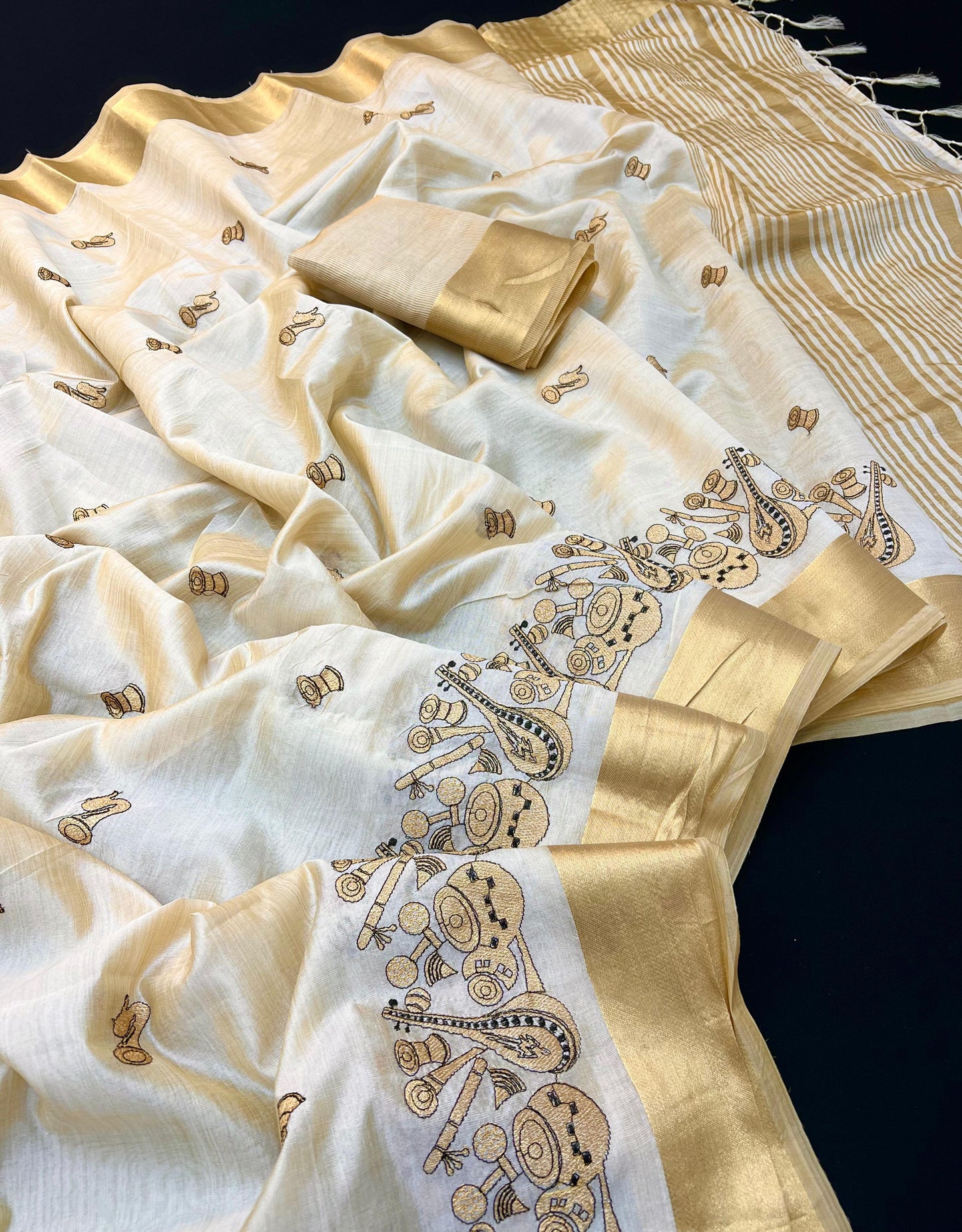 Cream Tusser Silk Saree with Traditional Musical Instruments Motifs