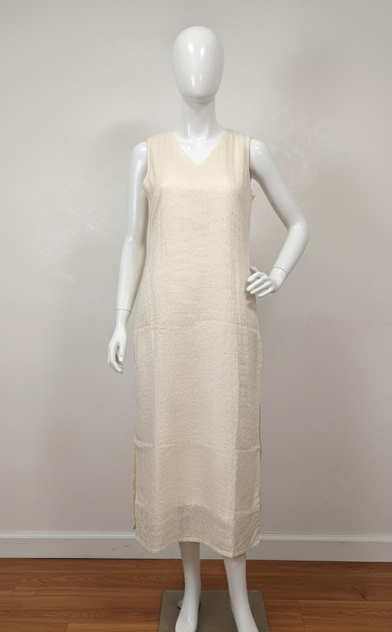 Off-white Hacoba cotton sleeveless kurta with self-textured embroidery, includes attached matching sleeves inside — elegant and versatile ethnic wear for women.