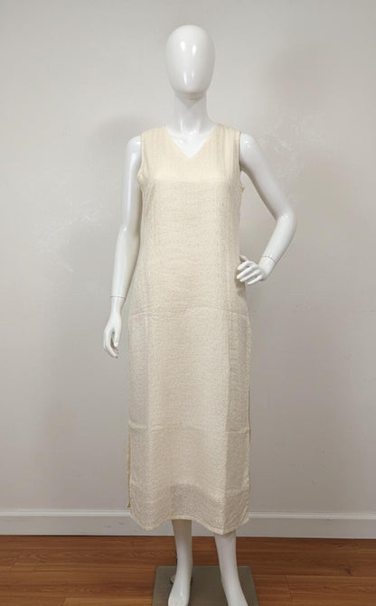 Off-white Hacoba cotton sleeveless kurta with self-textured embroidery, includes attached matching sleeves inside — elegant and versatile ethnic wear for women.