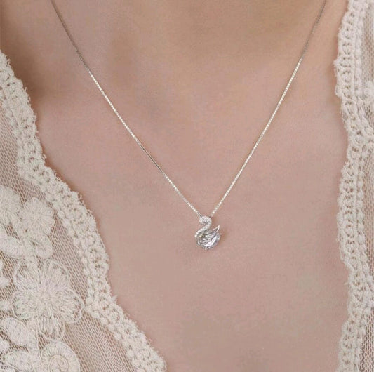 Elegant silver swan pendant necklace with crystal embellishments on delicate chain - graceful designer jewellery for UK customers