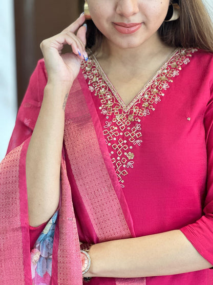 Fuchsia pink embroidered kurta set with floral organza dupatta — elegant festive outfit for Christmas and traditional celebrations.