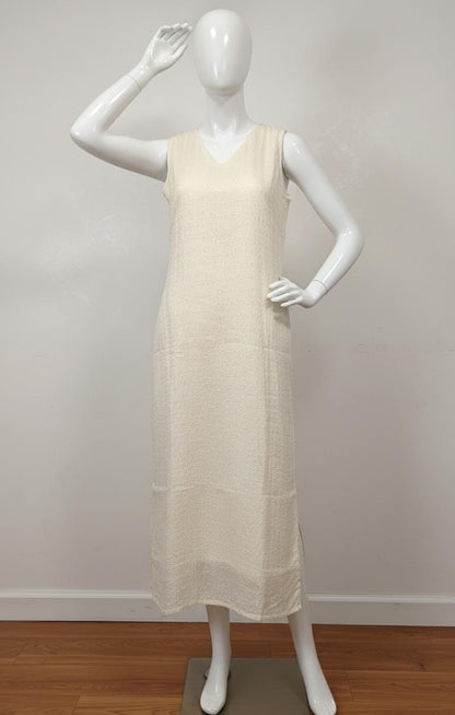 Off-white Hacoba cotton sleeveless kurta with self-textured embroidery, includes attached matching sleeves inside — elegant and versatile ethnic wear for women.