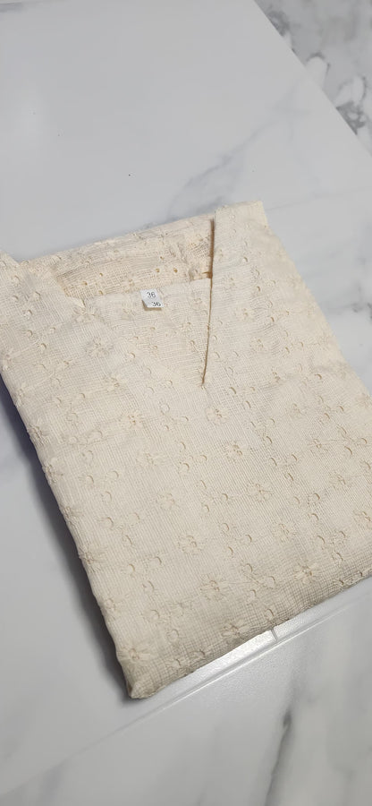 Off-white Hacoba cotton sleeveless kurta with self-textured embroidery, includes attached matching sleeves inside — elegant and versatile ethnic wear for women.