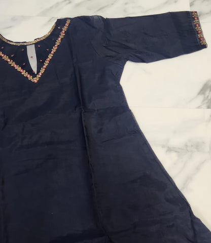 Navy blue silk embroidered dress with gold and red beadwork — elegant Christmas outfit for festive evenings.