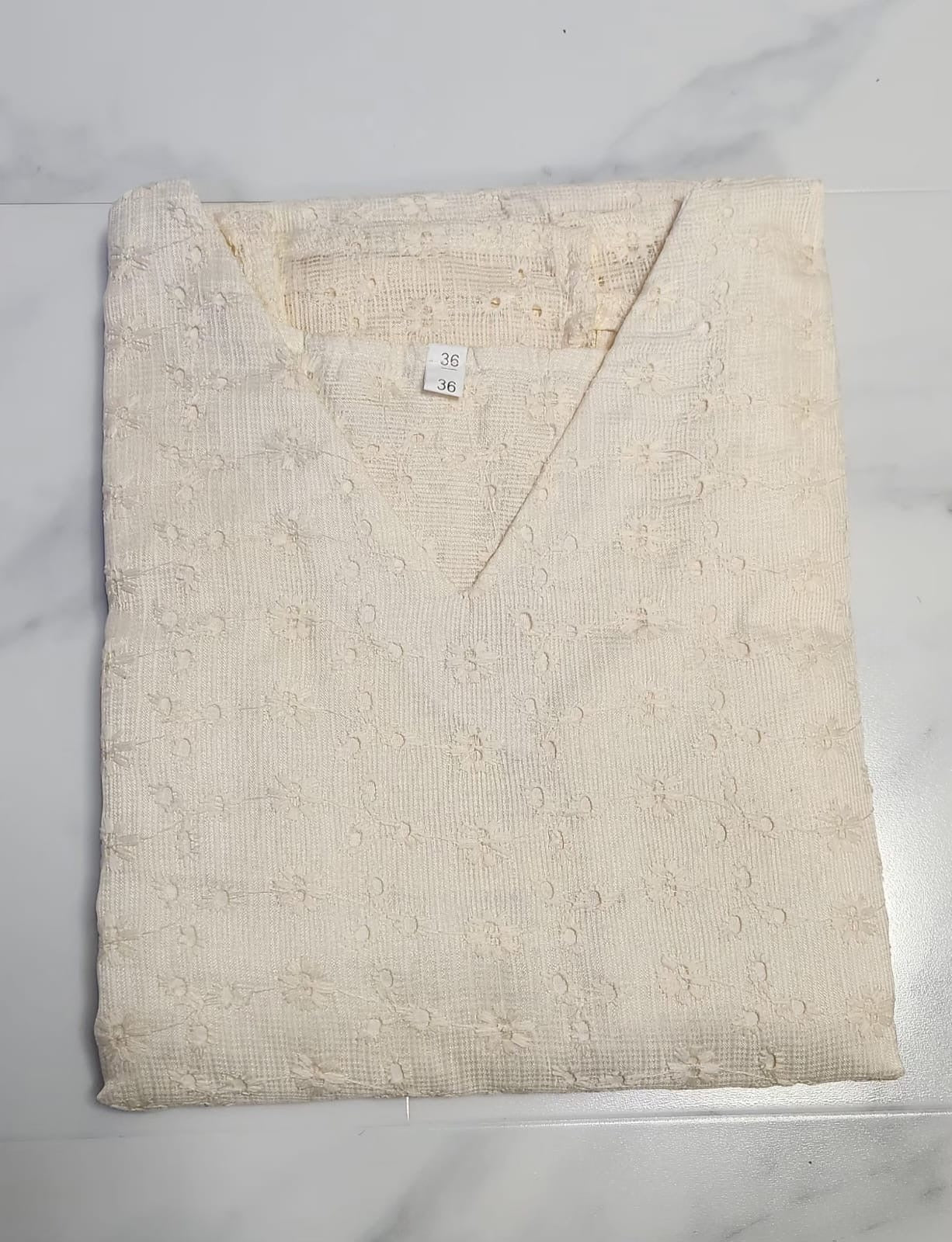 Off-white Hacoba cotton sleeveless kurta with self-textured embroidery, includes attached matching sleeves inside — elegant and versatile ethnic wear for women.