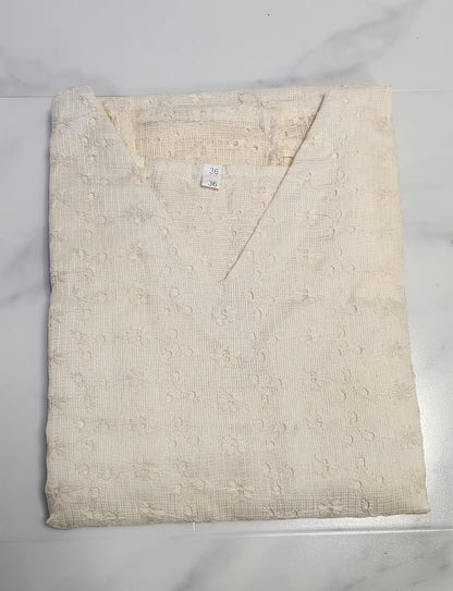 Off-white Hacoba cotton sleeveless kurta with self-textured embroidery, includes attached matching sleeves inside — elegant and versatile ethnic wear for women.