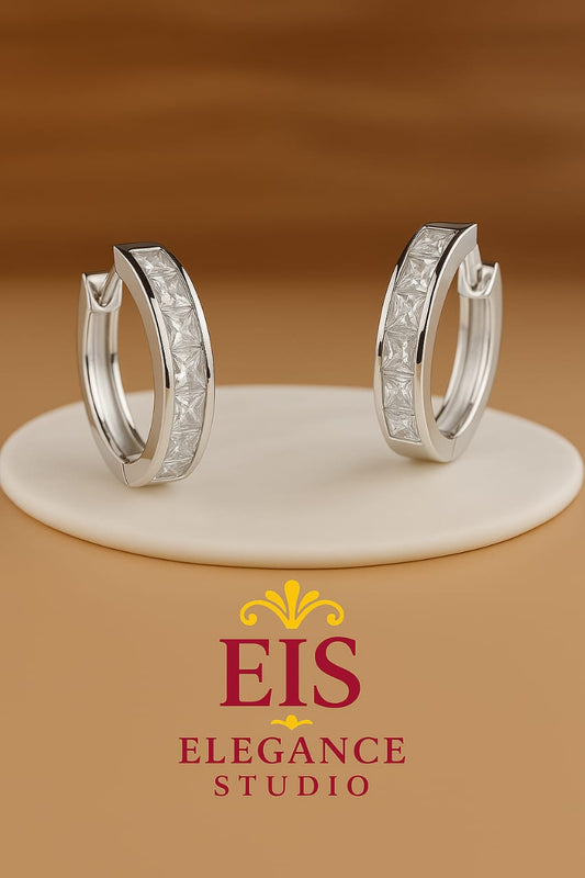 Elegant hoop earrings with crystal embellishments in gold plated and silver finishes
