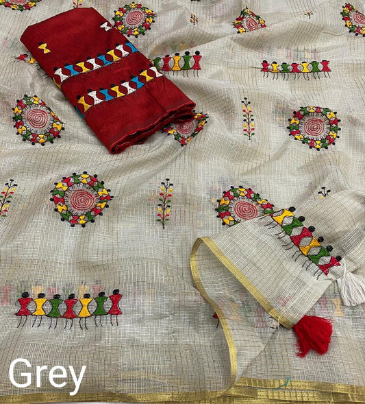 Hand-embroidered cotton saree with colorful folk art motifs showing traditional Indian handloom fabric and artisan embroidery work