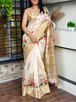 Typically traditional cream Assam silk saree with 3D concept design featuring pink lotus digital print, zari jacquard border and thread embroidered cut work - luxury Indian ethnic wear UK