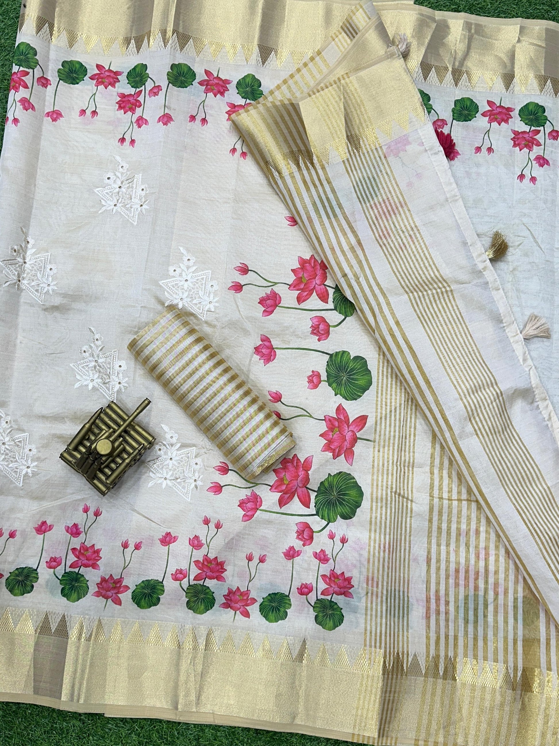 Typically traditional cream Assam silk saree with 3D concept design featuring pink lotus digital print, zari jacquard border and thread embroidered cut work - luxury Indian ethnic wear UK