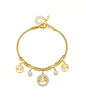 Gold Tree of Life charm bracelet with multiple symbolic tree pendants and crystal accents in elegant gift box - meaningful jewellery for UK customers