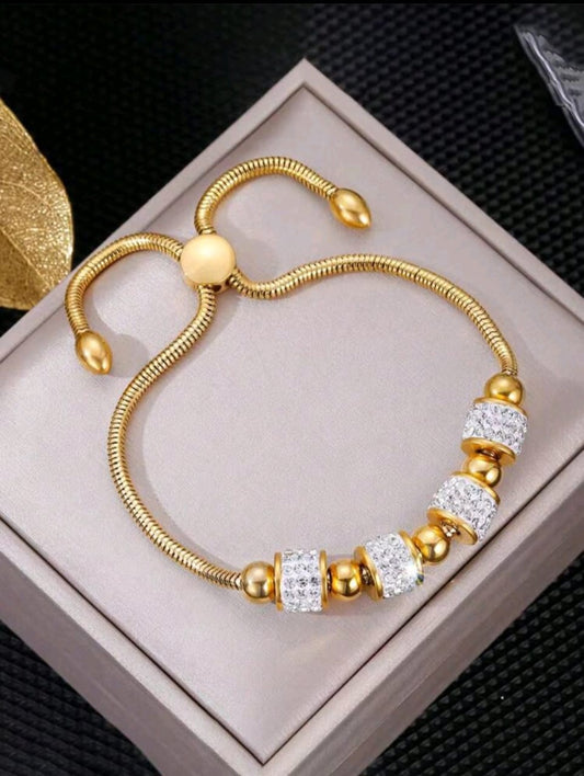 Luxury gold adjustable slider bracelet with crystal pavé beads and gold spacers in elegant gift box - contemporary tennis style jewellery UK”