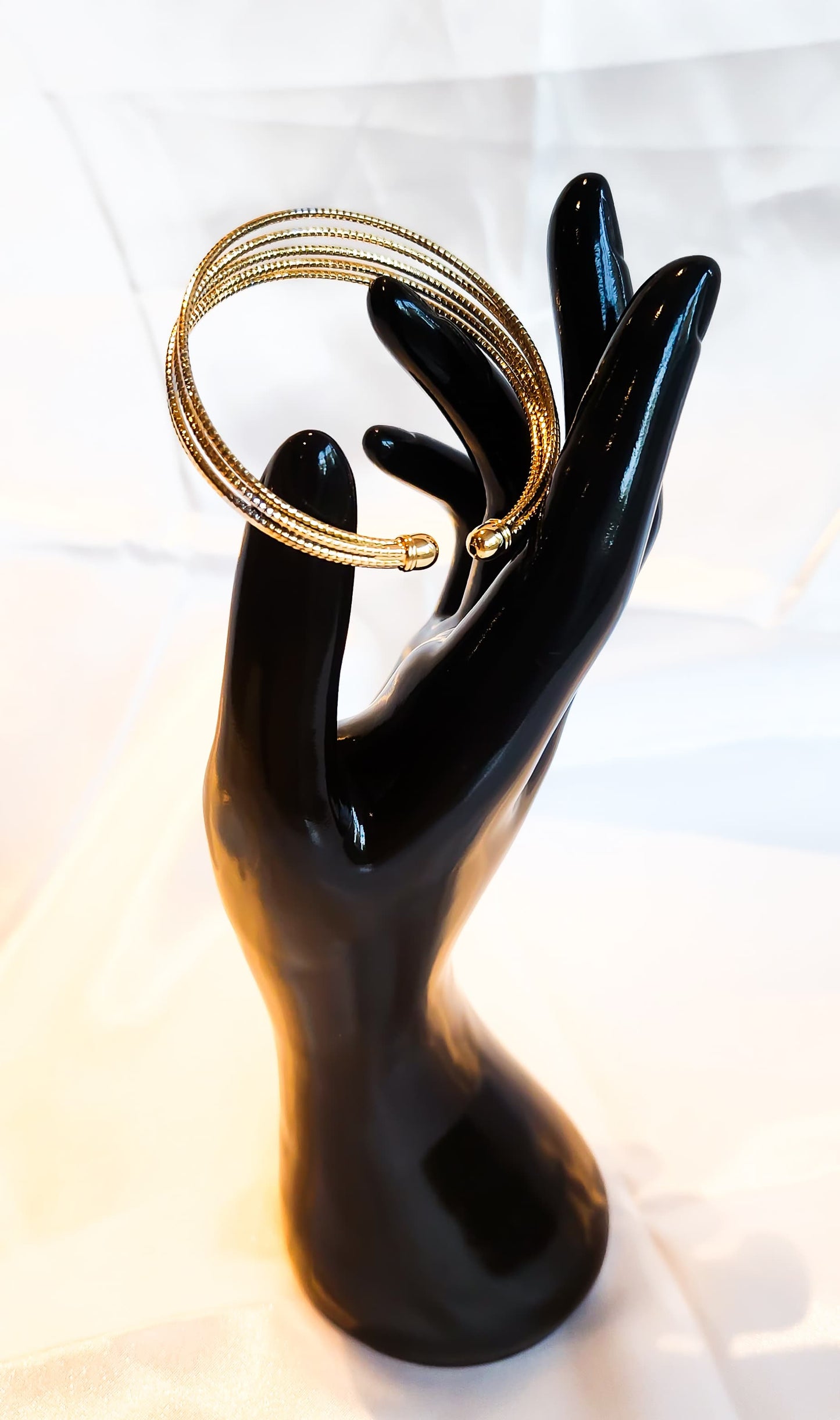 Multi-layered gold and silver bangle design for women