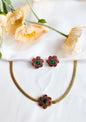 Multi-Coloured Floral Bloom Necklace Set with vibrant enamel detailing and matching earrings, perfect for festive and party wear.
