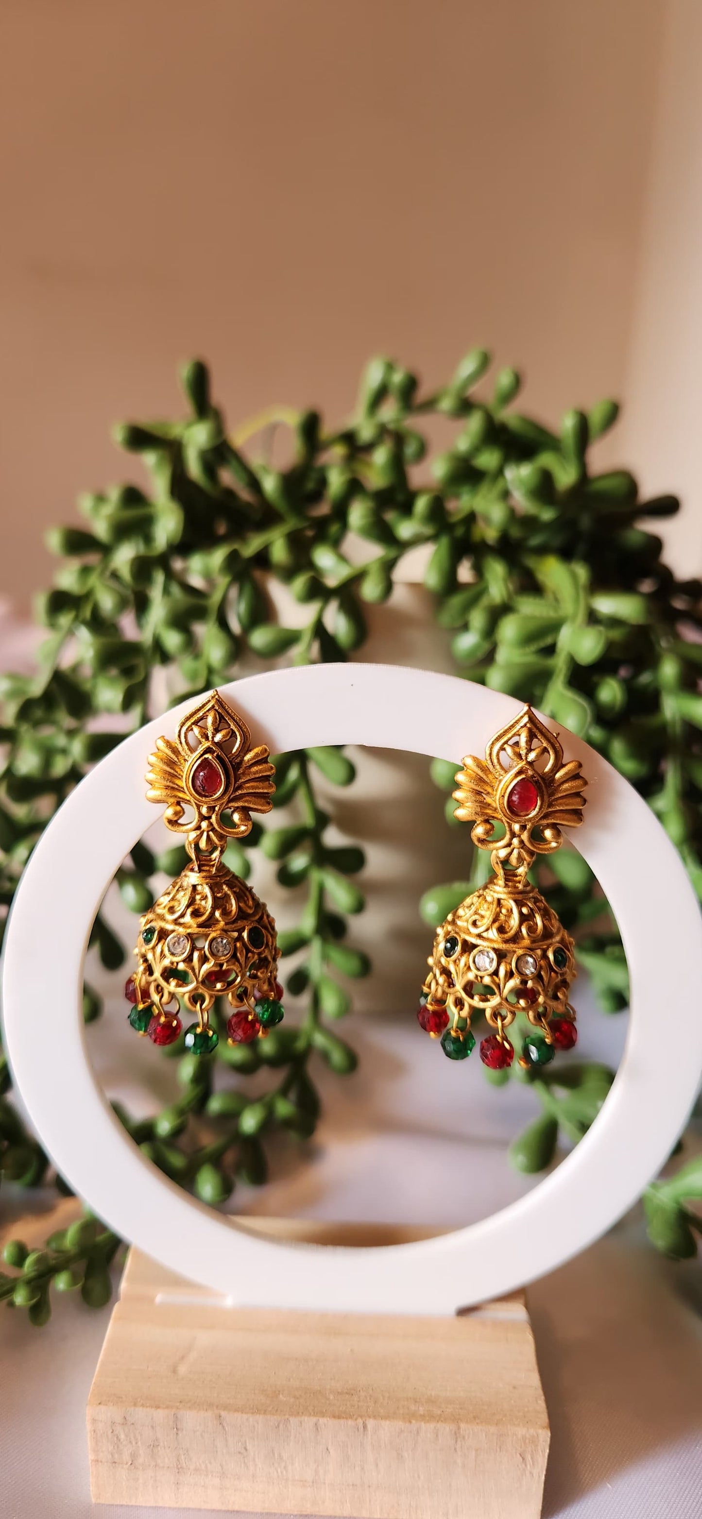 Antique Gold Peacock Wing Jhumka Earrings with Bead Tassels