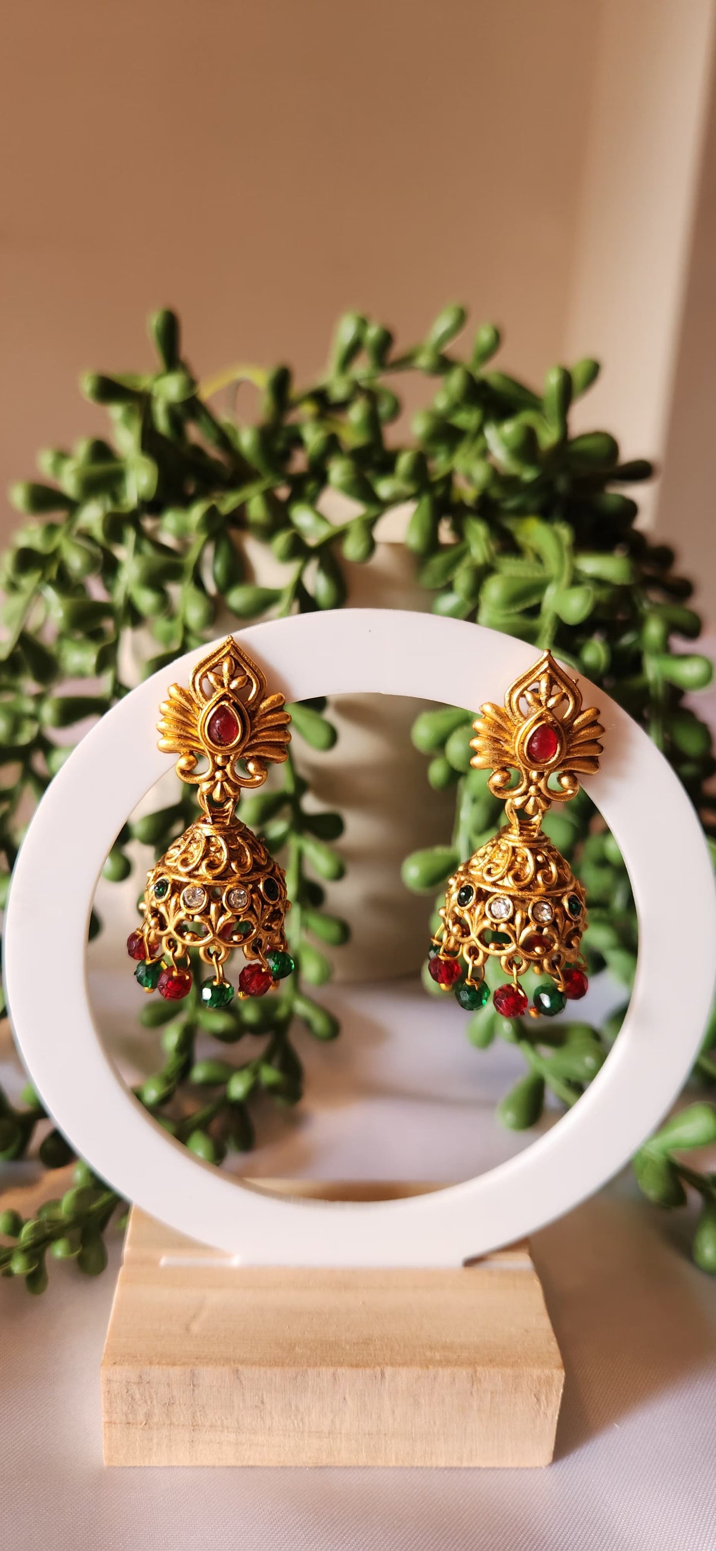 Antique Gold Peacock Wing Jhumka Earrings with Bead Tassels