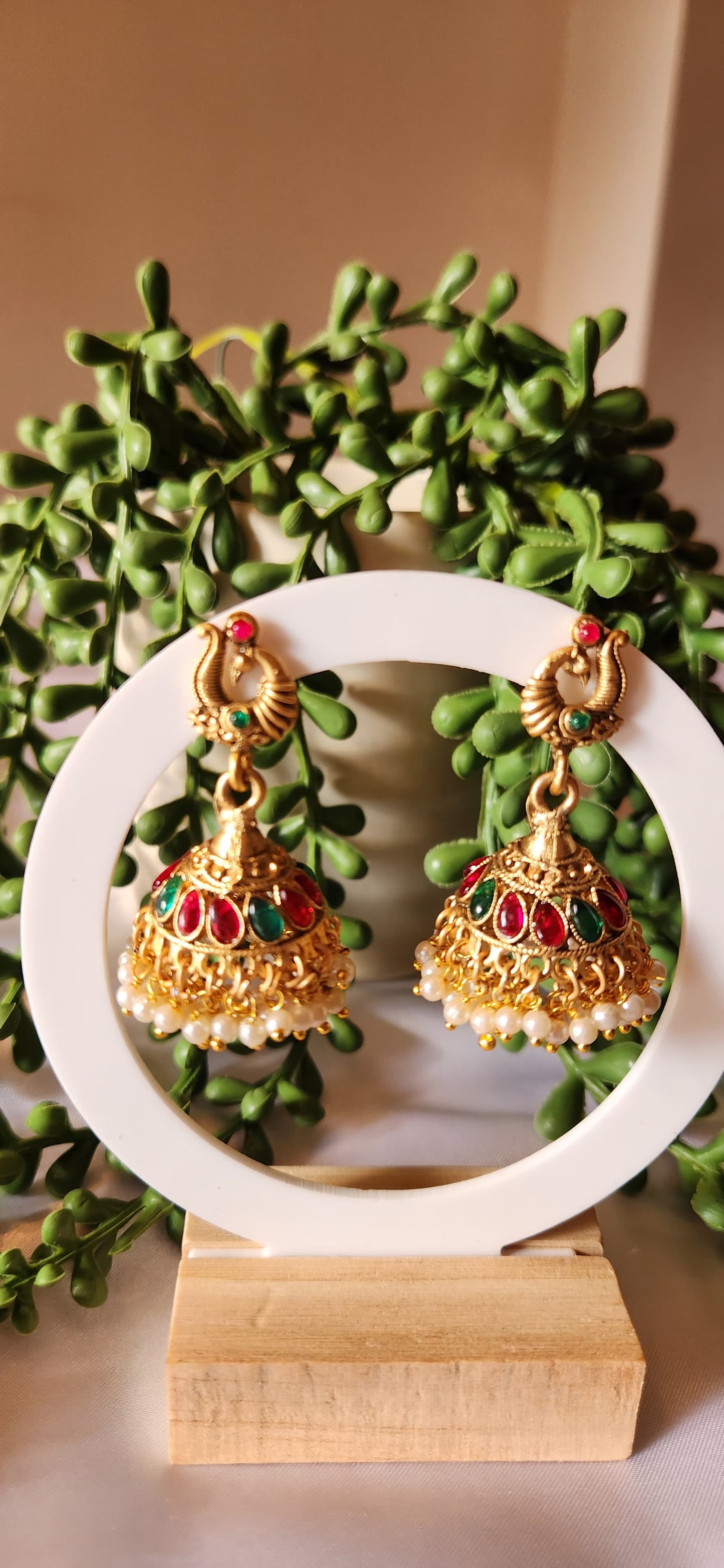 Antique Gold Peacock Jhumka Earrings with Kemp Stones