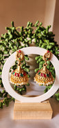 Antique Gold Peacock Jhumka Earrings with Kemp Stones