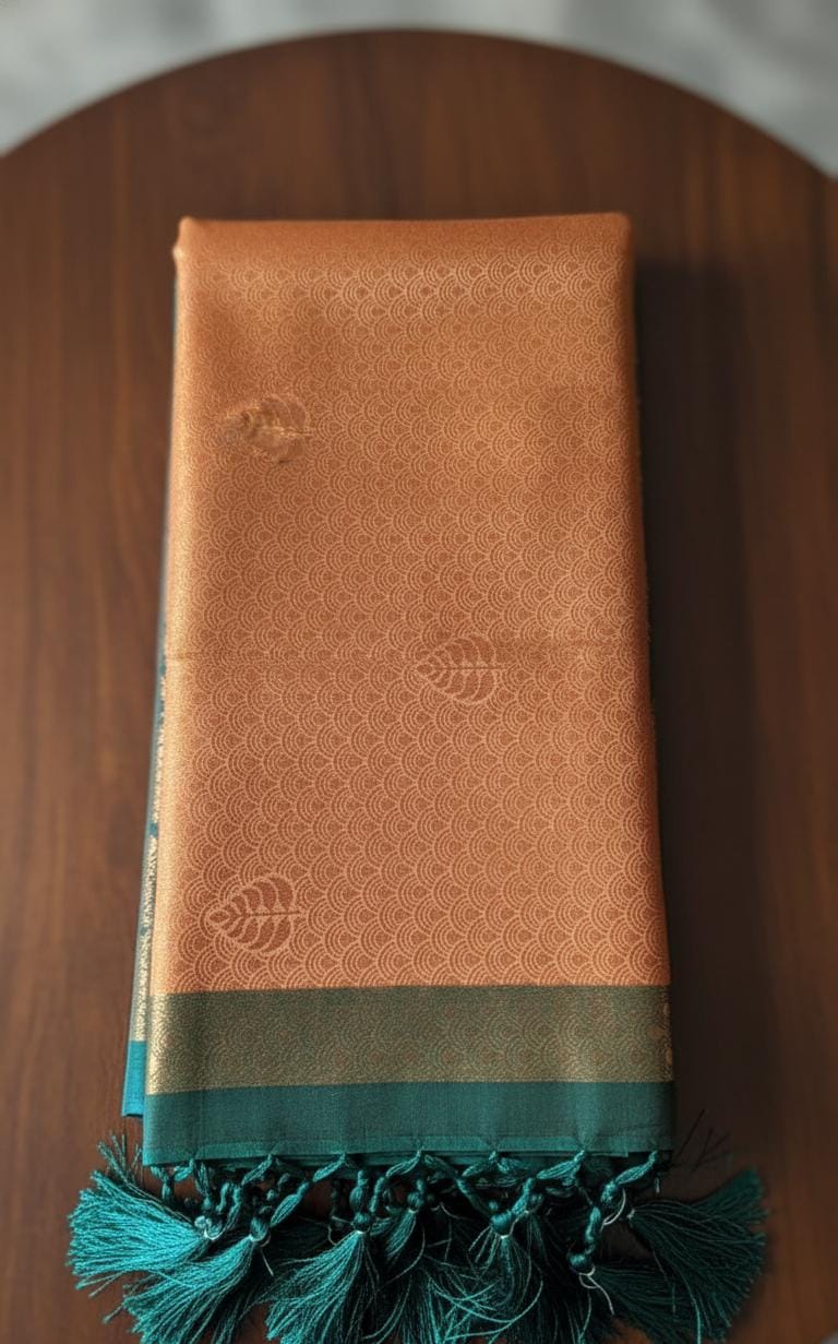 Kubera silk saree with elegant double-shaded weave and traditional border