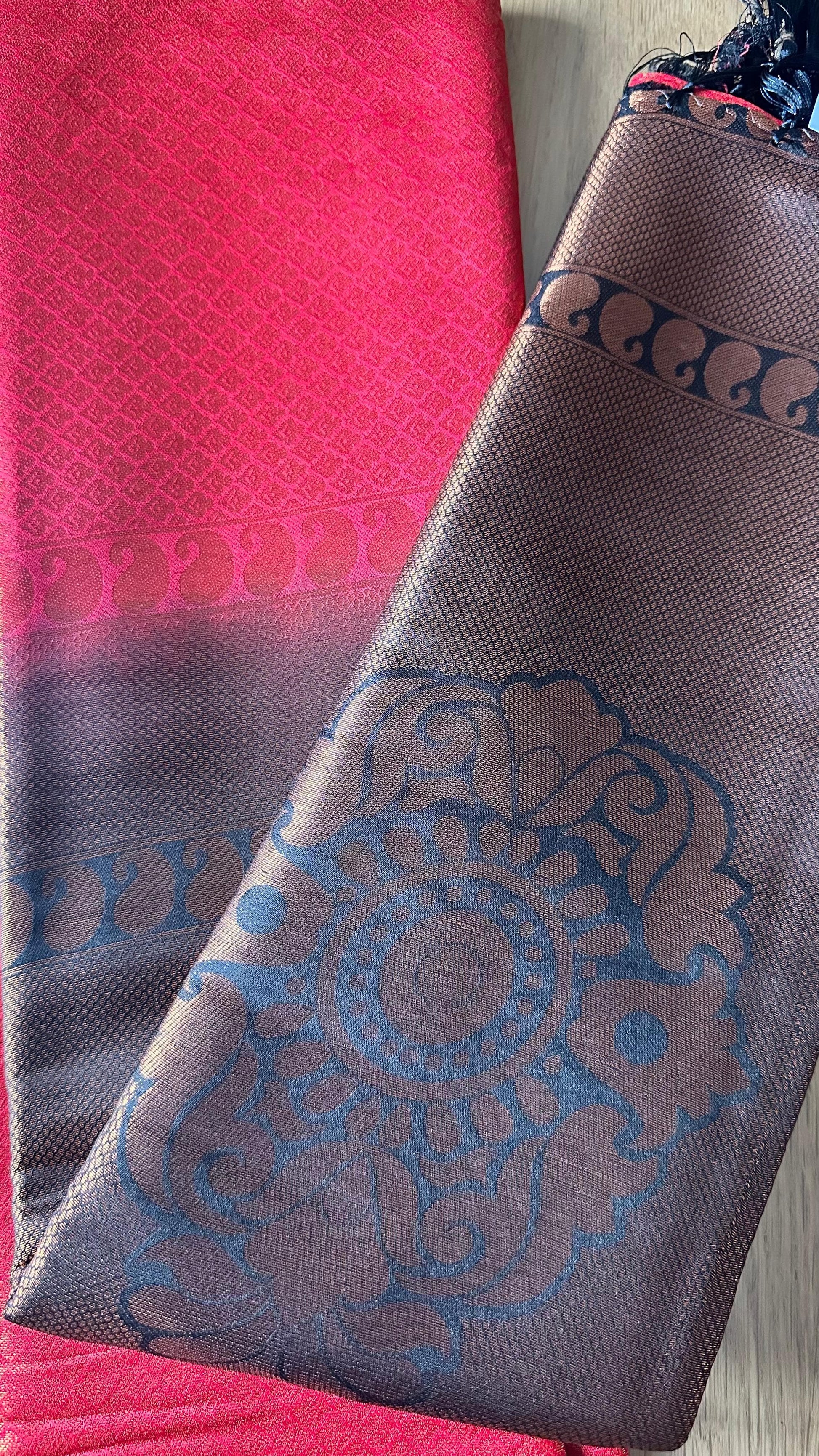 Premium silk saree with bold traditional motifs and tassels