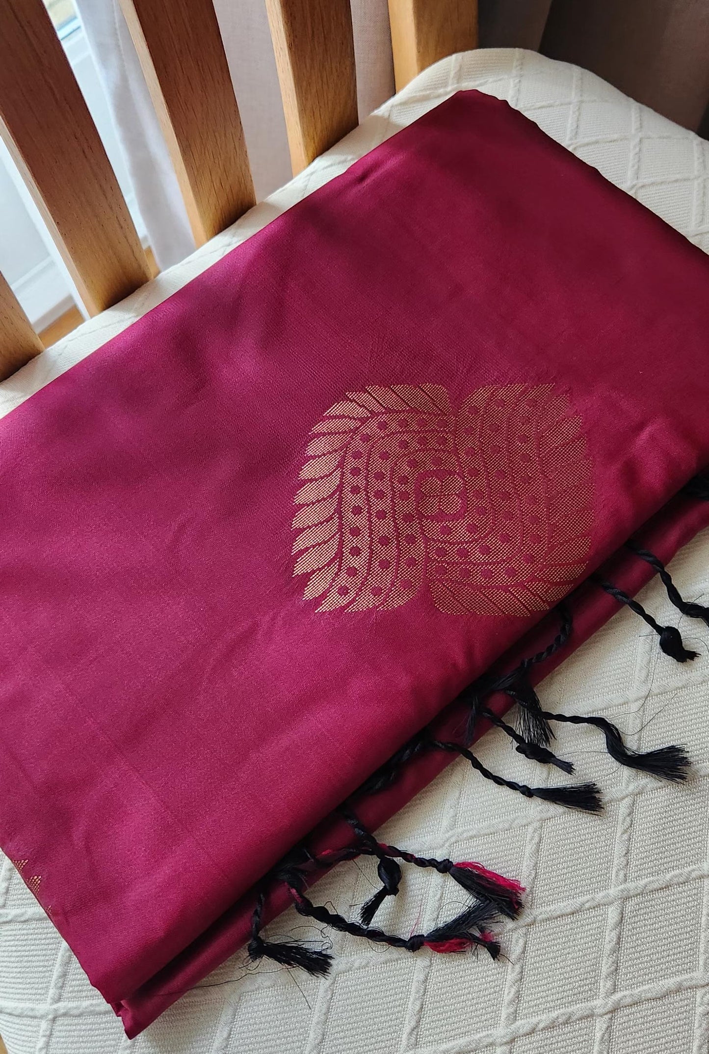 Wine garnet soft silk saree with antique gold zari pallu and woven motifs