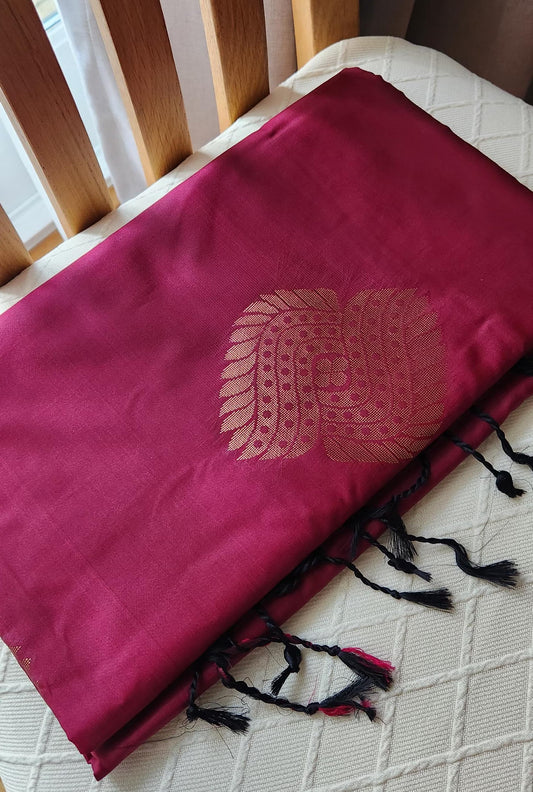 Wine garnet soft silk saree with antique gold zari pallu and woven motifs