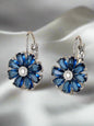 Elegant blue crystal flower earrings with silver-plated setting and lever-back closure - statement jewellery for UK formal occasions