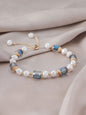 Elegant adjustable bracelet with freshwater pearls, blue crystals and gold-plated accents - luxury designer jewellery for UK customers