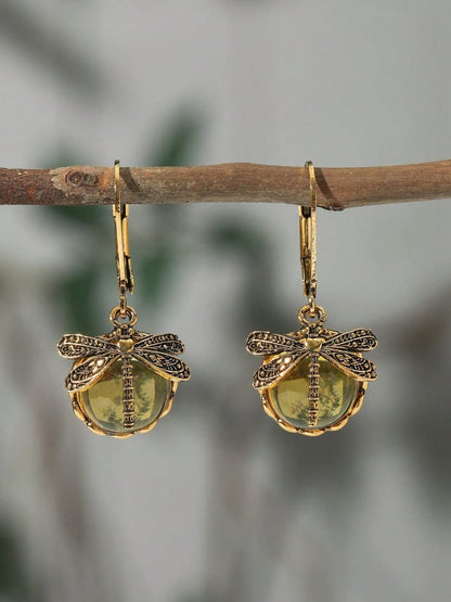 Enchanting vintage gold dragonfly earrings with coloured crystal drops in aqua blue, emerald green and amber yellow - nature-inspired designer jewellery UK