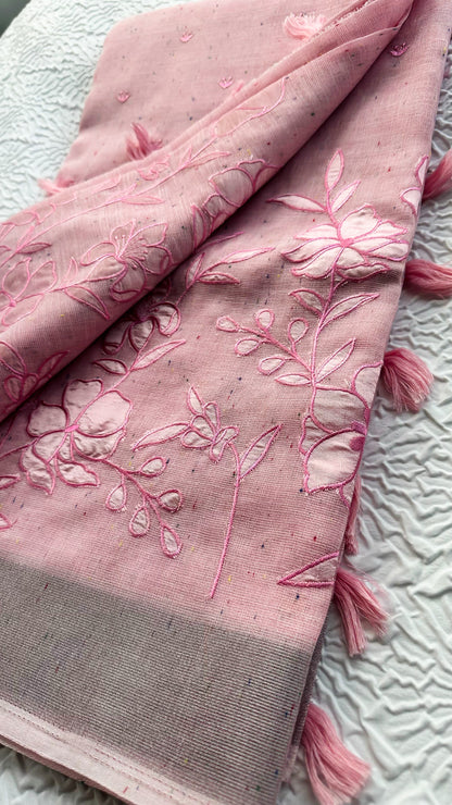 Soft Pink Linen Saree with Floral Appliqué Work & Tassel Detailing