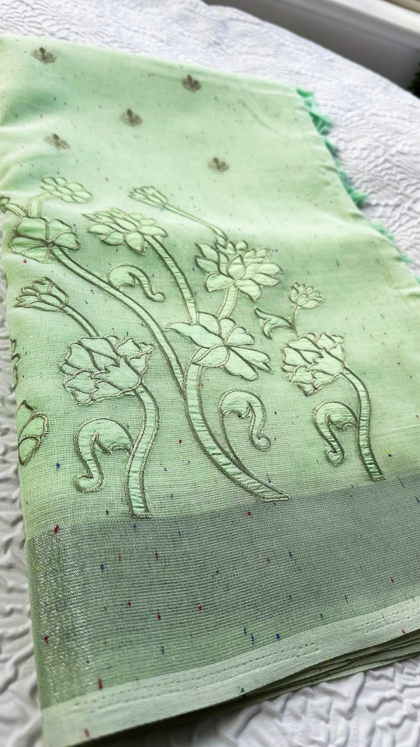 Light Green Linen Saree with Floral Appliqué Embroidery & Tassel Pallu