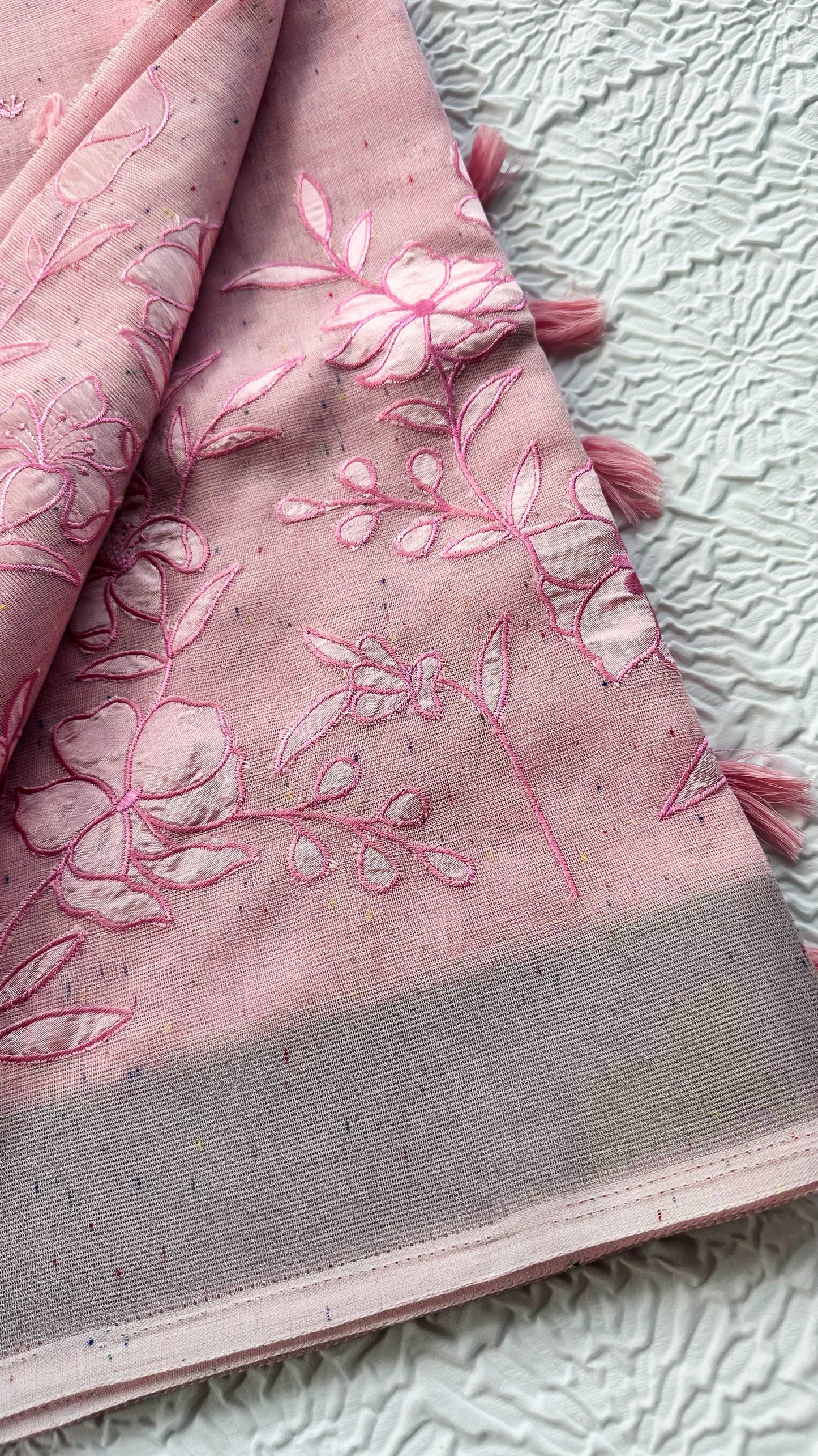 Soft Pink Linen Saree with Floral Appliqué Work & Tassel Detailing