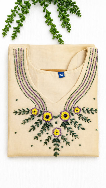 Tissue Kurta with Hand Beadwork Neckline – Onam Special | Cream Kurta with Gold Zari Sleeve Border